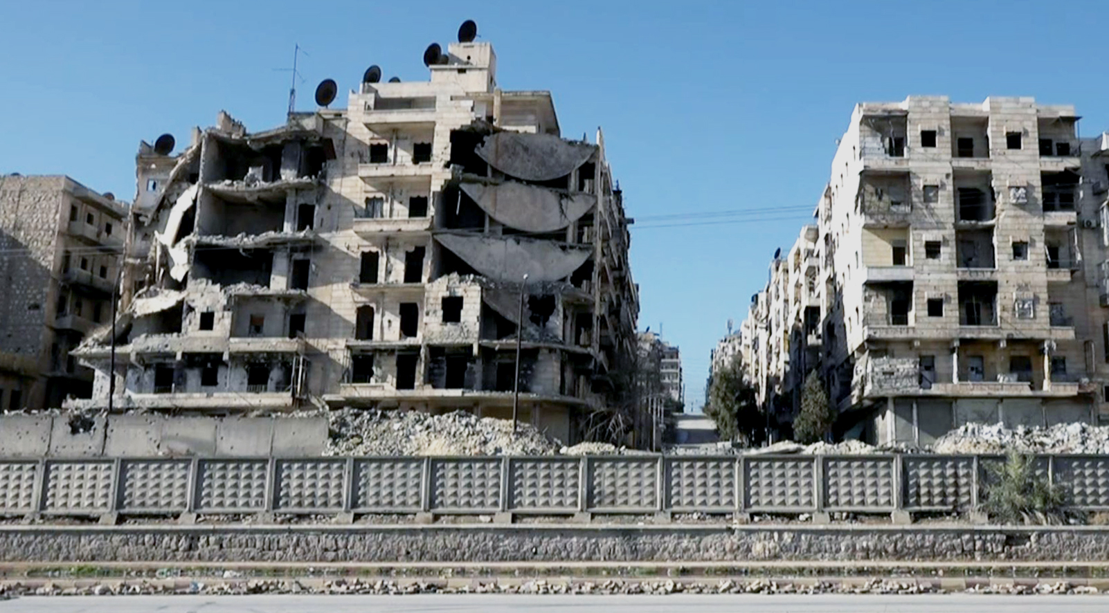 Damaged buildings in Aleppo's embattled neighbourhood of Sheikh Maqsood. Photo: Rudaw